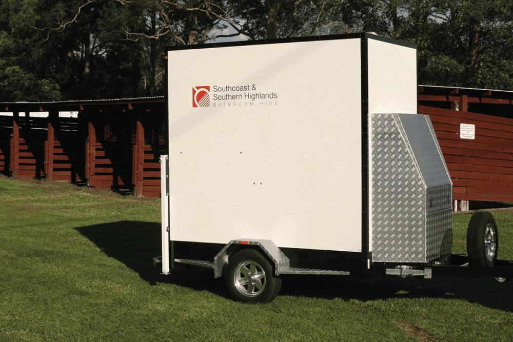 Modern, mobile bathroom trailer for event hire, available from Poo Carters, serving events and functions-